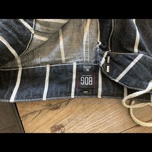 Black jeans with white stripes